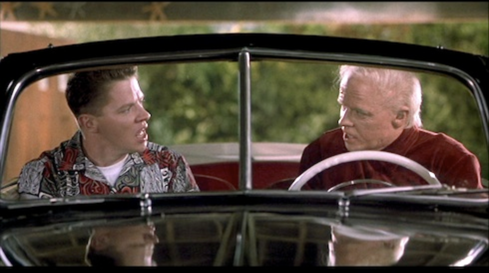 Movie still from Back to the Future 2: old Biff meets young Biff.